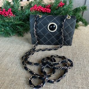Black and gold quilted small purse.